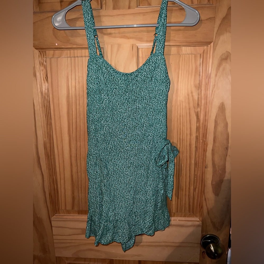Romper with wrap around skirt.